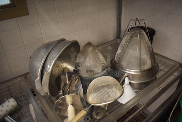 Metal 4 Tier Wire Shelving Unit on Commercial Casters w/ Contents Including Metal Pans, Metal Pitchers, Utensils and Drop In Bins. BUYER MUST DISMANTLE. PCI CANNOT DISMANTLE FOR SHIPPING. PLEASE CONSIDER FREIGHT CHARGES. 60x24x78. (Pastry Kitchen) - Image 5 of 7