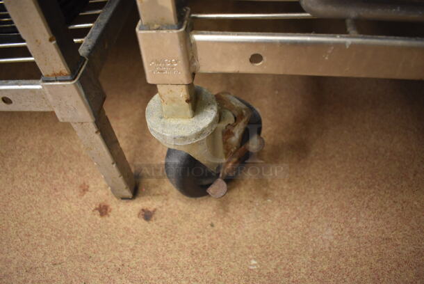 Metal 4 Tier Wire Shelving Unit on Commercial Casters w/ Contents Including Metal Pans, Metal Pitchers, Utensils and Drop In Bins. BUYER MUST DISMANTLE. PCI CANNOT DISMANTLE FOR SHIPPING. PLEASE CONSIDER FREIGHT CHARGES. 60x24x78. (Pastry Kitchen) - Image 7 of 7