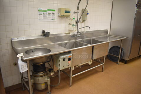 Stainless Steel Commercial 2 Bay Sink w/ Drain Board, Faucet, Handles, Spray Nozzle Attachment, Master Disposers Control Box and Masters Disposers Garbage Disposal. BUYER MUST REMOVE. 122x30x43. Bays 24x24x14. Drain Board 34x26x2. (Education Kitchen 2)