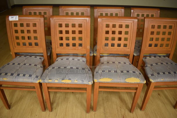 8 Wood Pattern Dining Chairs w/ Blue Seat Cushion. 19x17x36. 8 Times Your Bid! (Classroom 1)