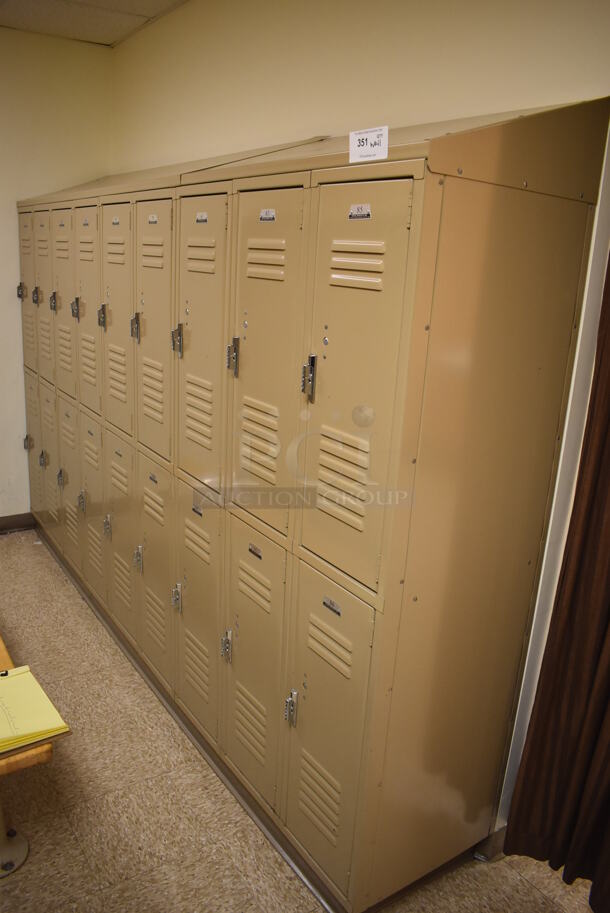 Wall of 19 Tan Metal Lockers. BUYER MUST REMOVE. 132x18x71. (Womens Locker Room) - Image 1 of 6