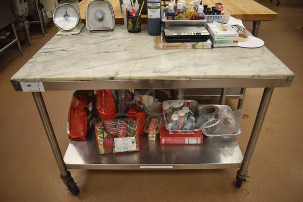 Stainless Steel Table w/ Marble Countertop and Stainless Steel Under Shelf on Commercial Casters. Does Not Include Contents. 48x30x35. (Pastry Kitchen)