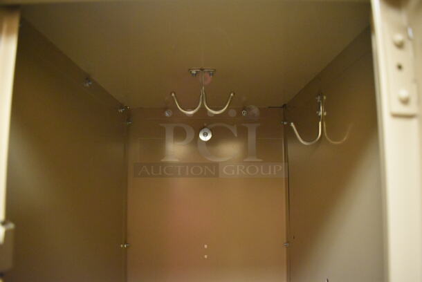 Wall of 22 Tan Metal Lockers. BUYER MUST REMOVE. 132x18x71. (Womens Locker Room) - Image 3 of 5