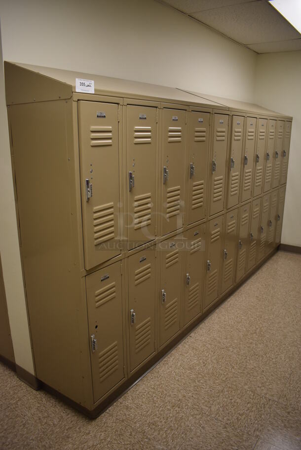 Wall of 22 Tan Metal Lockers. BUYER MUST REMOVE. 145x18x71. (Mens Locker Room) - Image 1 of 7