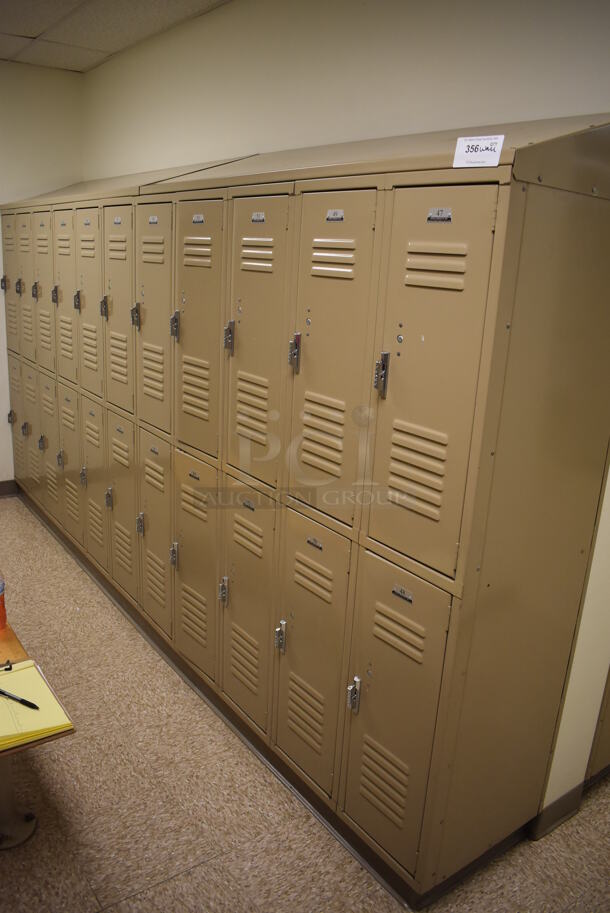 Wall of 22 Tan Metal Lockers. BUYER MUST REMOVE. 132x18x71. (Mens Locker Room) - Image 1 of 5