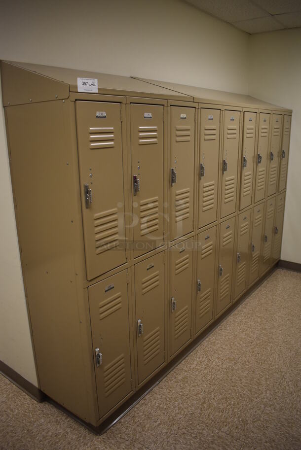 Wall of 18 Tan Metal Lockers. BUYER MUST REMOVE. 108x18x71. (Mens Locker Room)