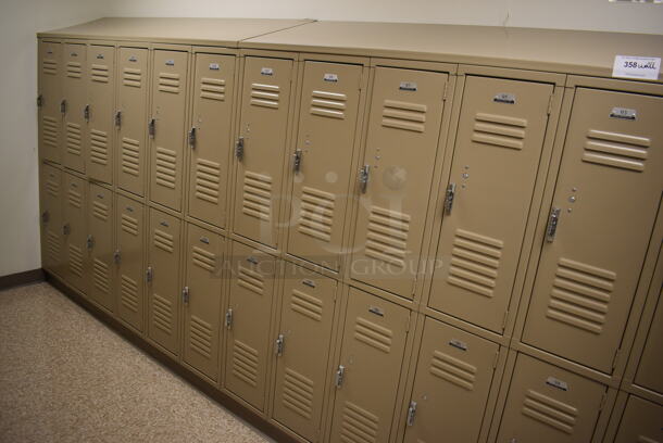 Wall of 46 Tan Metal Lockers. BUYER MUST REMOVE. 280x18x71. (Mens Locker Room)