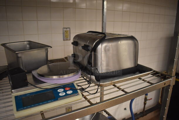 Metal 4 Tier Wire Shelving Unit w/ Contents Including Attachments and Scale. Does NOT Include The 2 Mixers on the Top Shelf. BUYER MUST DISMANTLE. PCI CANNOT DISMANTLE FOR SHIPPING. PLEASE CONSIDER FREIGHT CHARGES. 48x24x84. (Education Kitchen 2) - Image 6 of 7
