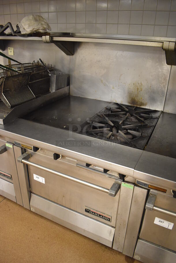 Garland M42-6R Stainless Steel Commercial Floor Style Natural Gas Powered 2 Burner Range w/ Flat Top, Oven, Over Shelf and Back Splash. BUYER MUST REMOVE. 34x38x58. Tested and Working! (Education Kitchen 2) - Image 2 of 9