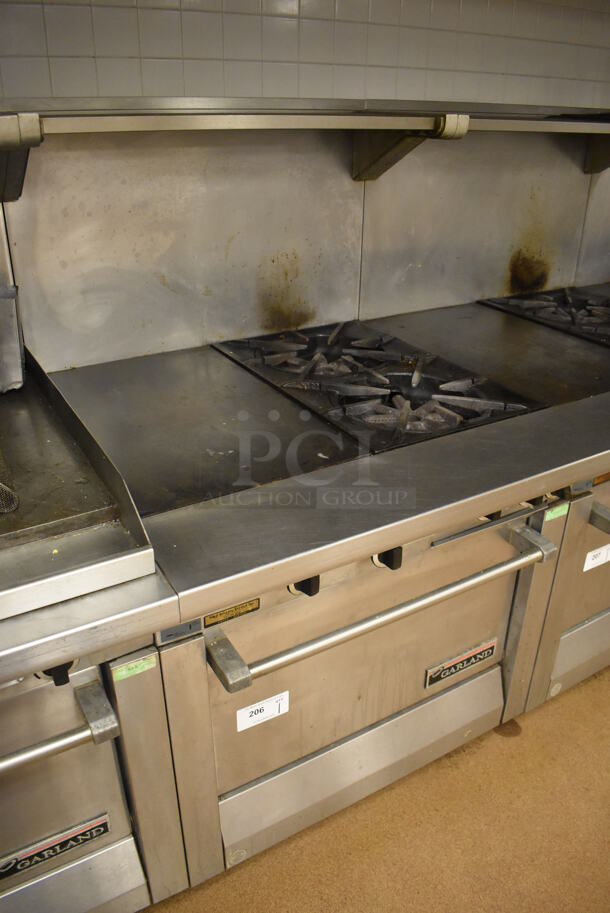 Garland M42-6R Stainless Steel Commercial Floor Style Natural Gas Powered 2 Burner Range w/ Flat Top, Oven, Over Shelf and Back Splash. BUYER MUST REMOVE. 34x38x58. Tested and Working! (Education Kitchen 2) - Image 3 of 9