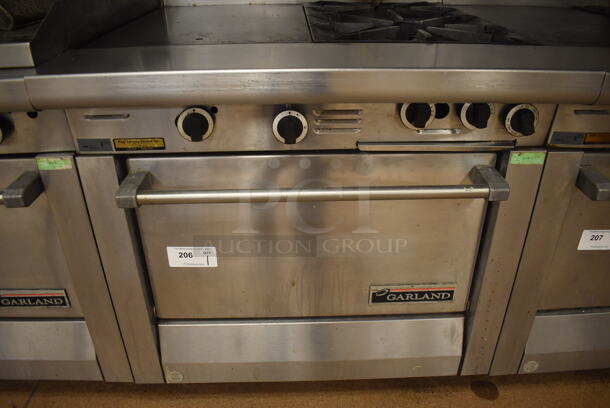 Garland M42-6R Stainless Steel Commercial Floor Style Natural Gas Powered 2 Burner Range w/ Flat Top, Oven, Over Shelf and Back Splash. BUYER MUST REMOVE. 34x38x58. Tested and Working! (Education Kitchen 2) - Image 4 of 9