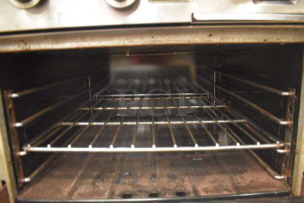 Garland M42-6R Stainless Steel Commercial Floor Style Natural Gas Powered 2 Burner Range w/ Flat Top, Oven, Over Shelf and Back Splash. BUYER MUST REMOVE. 34x38x58. Tested and Working! (Education Kitchen 2) - Image 7 of 9