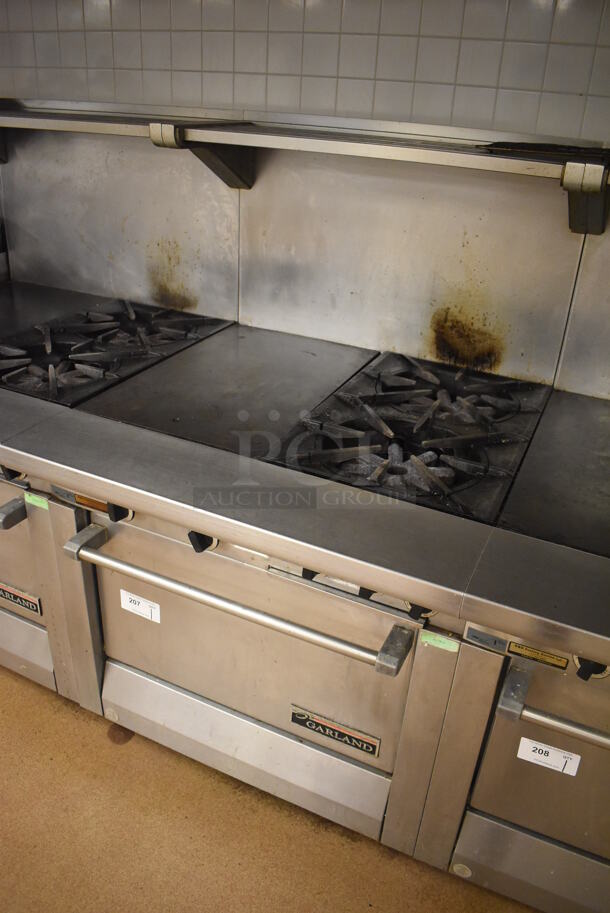 Garland M42-6R Stainless Steel Commercial Floor Style Natural Gas Powered 2 Burner Range w/ Flat Top, Oven, Over Shelf and Back Splash. BUYER MUST REMOVE. 34x38x58. Tested and Working! (Education Kitchen 2) - Image 2 of 8