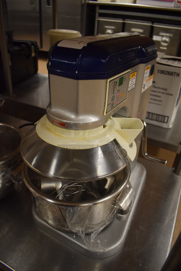Vollrath MIX1007 Metal Commercial Countertop 7 Quart Planetary Dough Mixer w/ 2 Metal Mixing Bowl, Poly Bowl Guard, 2 Paddle, 2 Whisk and 2 Dough Hook Attachments. 110 Volts, 1 Phase. 12x17x19. Tested and Working! (Pastry Kitchen) - Image 1 of 6
