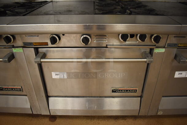Garland M42-6R Stainless Steel Commercial Floor Style Natural Gas Powered 2 Burner Range w/ Flat Top, Oven, Over Shelf and Back Splash. BUYER MUST REMOVE. 34x38x58. Tested and Working! (Education Kitchen 2) - Image 5 of 8