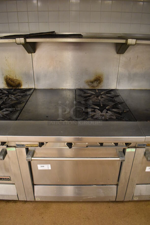 Garland M42-6R Stainless Steel Commercial Floor Style Natural Gas Powered 2 Burner Range w/ Flat Top, Oven, Over Shelf and Back Splash. BUYER MUST REMOVE. 34x38x58. Tested and Working! (Education Kitchen 2)