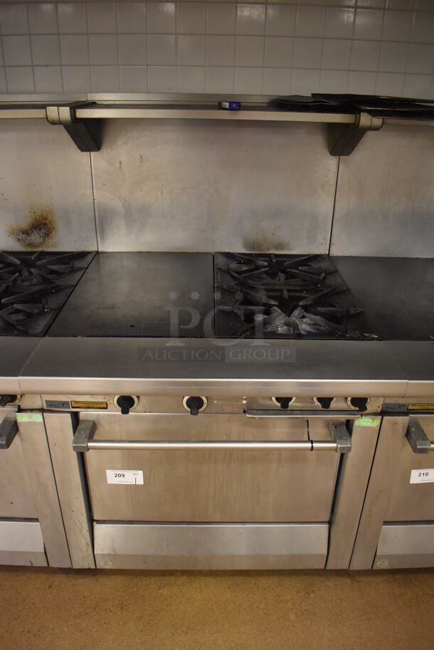 Garland M42-6R Stainless Steel Commercial Floor Style Natural Gas Powered 2 Burner Range w/ Flat Top, Oven, Over Shelf and Back Splash. BUYER MUST REMOVE. 34x38x58. Tested and Working! (Education Kitchen 2)