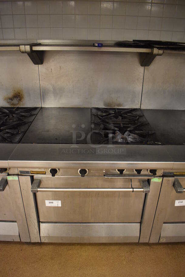 Garland M42-6R Stainless Steel Commercial Floor Style Natural Gas Powered 2 Burner Range w/ Flat Top, Oven, Over Shelf and Back Splash. BUYER MUST REMOVE. 34x38x58. Tested and Working! (Education Kitchen 2) - Image 1 of 8