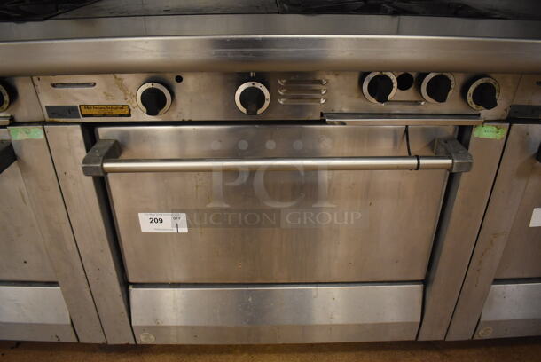 Garland M42-6R Stainless Steel Commercial Floor Style Natural Gas Powered 2 Burner Range w/ Flat Top, Oven, Over Shelf and Back Splash. BUYER MUST REMOVE. 34x38x58. Tested and Working! (Education Kitchen 2) - Image 5 of 8