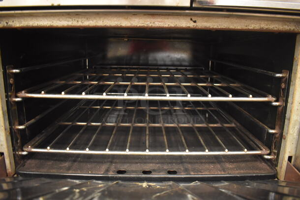 Garland M42-6R Stainless Steel Commercial Floor Style Natural Gas Powered 2 Burner Range w/ Flat Top, Oven, Over Shelf and Back Splash. BUYER MUST REMOVE. 34x38x58. Tested and Working! (Education Kitchen 2) - Image 6 of 8