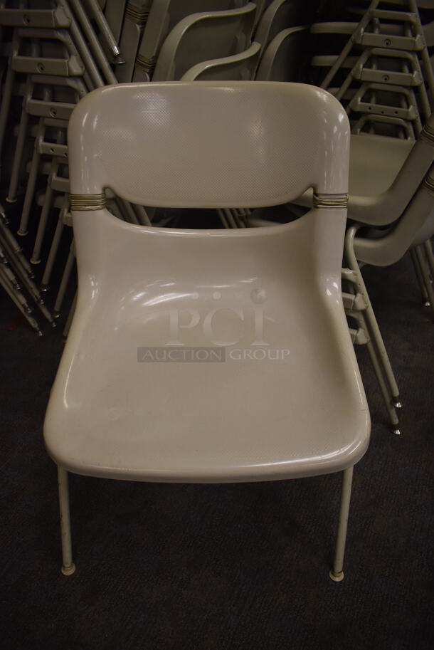 28 Tan Poly Chair on Metal Legs. Stock Picture - Cosmetic Condition May Vary. 23x20x32. 28 Times Your Bid! (Classroom 5-8)