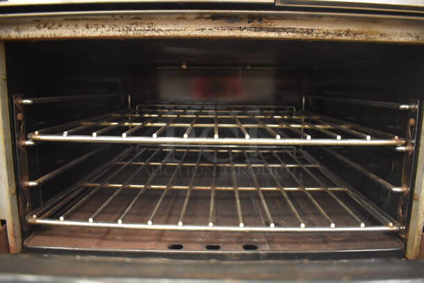 Garland M42-6R Stainless Steel Commercial Floor Style Natural Gas Powered 2 Burner Range w/ Flat Top, Oven, Over Shelf and Back Splash. BUYER MUST REMOVE. 34x38x58. Tested and Working! (Education Kitchen 2) - Image 6 of 8