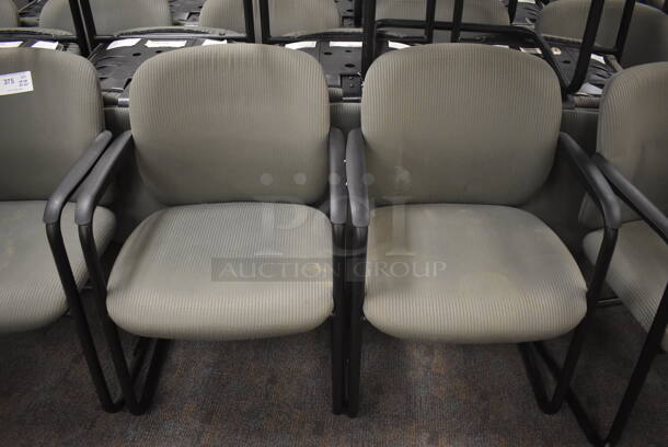 20 Gray Chairs w/ Arm Rests. Stock Picture - Cosmetic Condition May Vary. BUYER MUST REMOVE. 23x20x33. 20 Times Your Bid! (Classroom 5-8) - Image 1 of 4