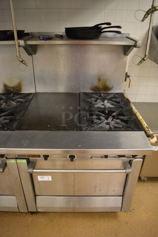 Garland M42-6R Stainless Steel Commercial Floor Style Natural Gas Powered 2 Burner Range w/ Flat Top, Oven, Over Shelf and Back Splash. BUYER MUST REMOVE. 34x38x58. Tested and Working! (Education Kitchen 2)