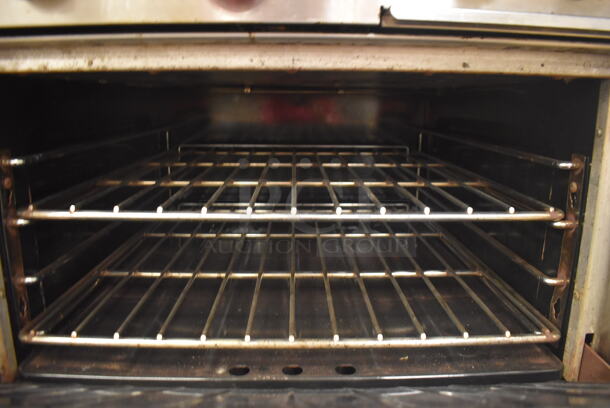 Garland M42-6R Stainless Steel Commercial Floor Style Natural Gas Powered 2 Burner Range w/ Flat Top, Oven, Over Shelf and Back Splash. BUYER MUST REMOVE. 34x38x58. Tested and Working! (Education Kitchen 2) - Image 6 of 8