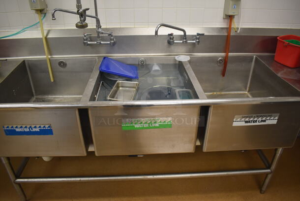 Stainless Steel Commercial 3 Bay Sink w/ Dual Drain Boards, 2 Faucets, 2 Handle Sets and Spray Nozzle Attachment. BUYER MUST REMOVE. 134x36x43. Bays 24x30x14. Drain Boards 28x32x2. (Education Kitchen) - Image 3 of 6