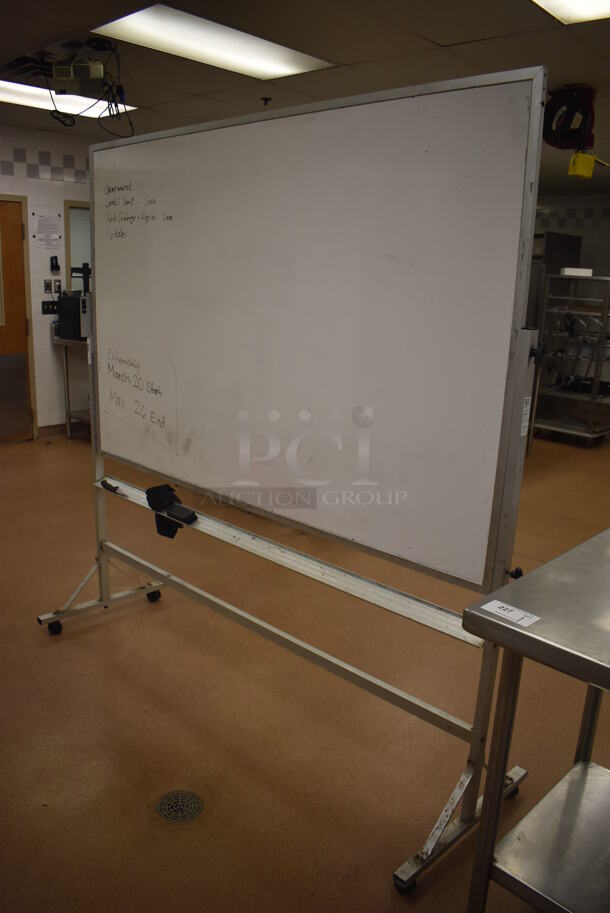 White Board on Casters. 75x24x78. (Education Kitchen 2)