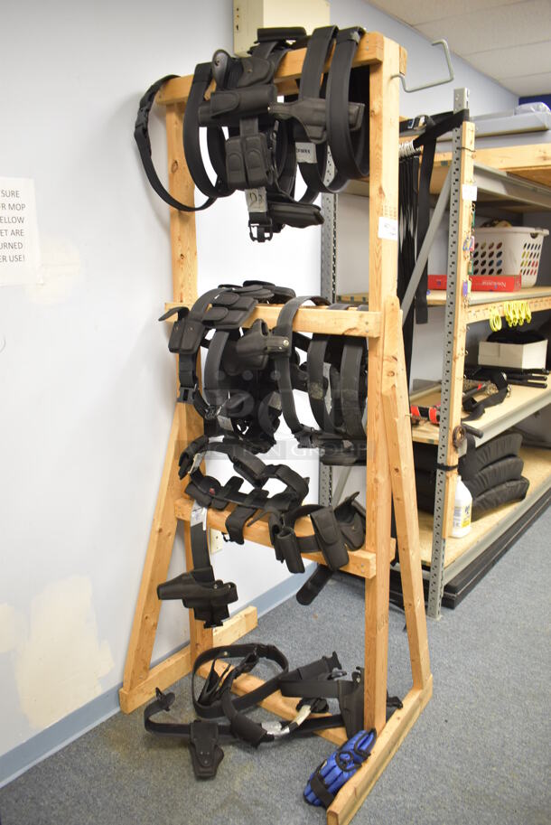 ALL ONE MONEY! Lot of Wooden Rack w/ Holsters. (Classroom 10)