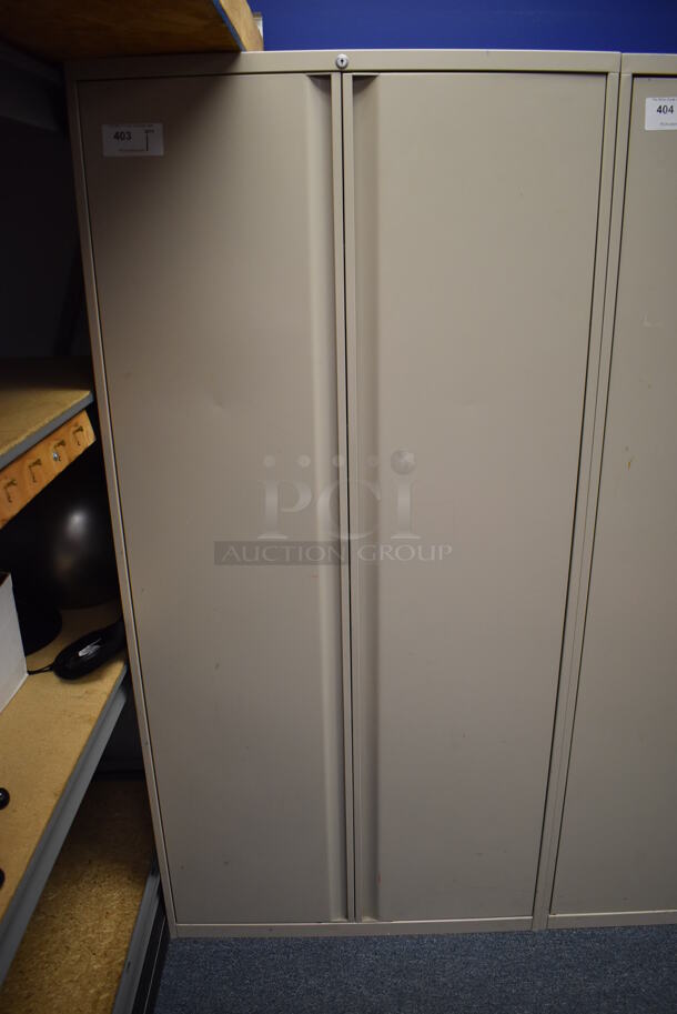 Tan Metal 2 Door Cabinet w/ Contents. 36x20x75. (Classroom 10)