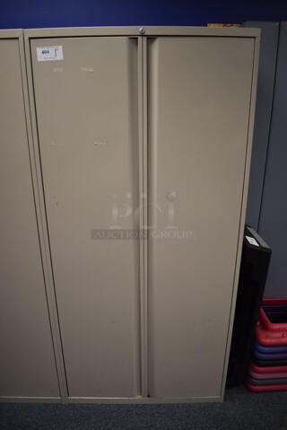 Tan Metal 2 Door Cabinet w/ Contents. 36x20x75. (Classroom 10)