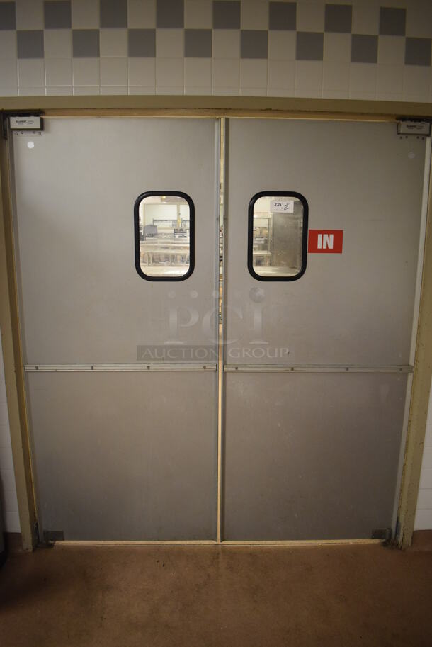 2 Eliason Metal Commercial Swinging Kitchen Doors. BUYER MUST REMOVE. 35x1.5x78.5. 2 Times Your Bid! (Dishroom)