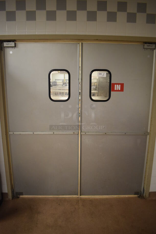 2 Eliason Metal Commercial Swinging Kitchen Doors. BUYER MUST REMOVE. 35x1.5x78.5. 2 Times Your Bid! (Dishroom) - Image 1 of 3