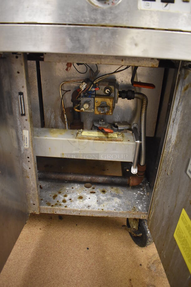 Frymaster FM245ESC Stainless Steel Commercial Floor Style Natural Gas Powered 2 Bay Deep Fat Fryer w/ Left Side Filter Magic II Filter Station and 3 Lids on Commercial Casters. 122,000 BTU. BUYER MUST REMOVE. 47x32x48. Tested and Working! (Education Kitchen) - Image 6 of 12