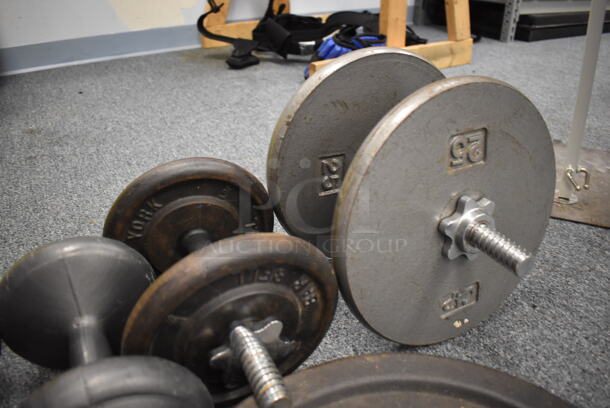 ALL ONE MONEY! Lot of 4 5 Pound Dumbbells, 10 Pound Weight Plate, 50 Pound Weight Plate, 2 10 Pound Dumbbells, 25 Pound Dumbbell. (Classroom 10) - Image 6 of 6