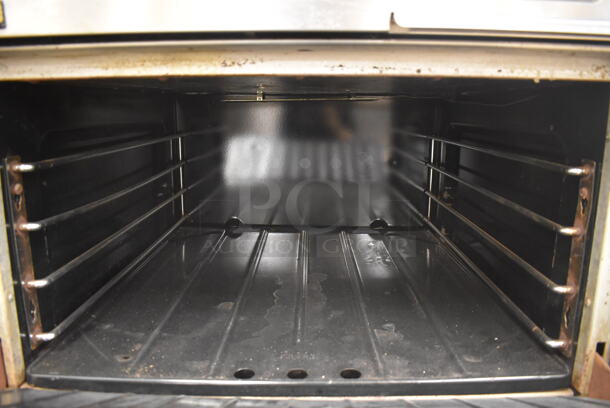 Garland M42-6R Stainless Steel Commercial Natural Gas Powered 2 Burner Range w/ Flat Top, Oven, Over Shelf and Back Splash. BUYER MUST REMOVE. 34x38x58. Tested and Working! (Education Kitchen) - Image 7 of 8