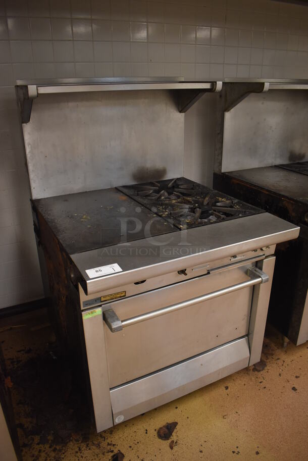 Garland M42-6R Stainless Steel Commercial Natural Gas Powered 2 Burner Range w/ Flat Top, Oven, Over Shelf and Back Splash. BUYER MUST REMOVE. 34x38x58. Tested and Working! (Education Kitchen) - Image 3 of 7
