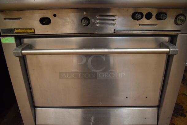 Garland M42-6R Stainless Steel Commercial Natural Gas Powered 2 Burner Range w/ Flat Top, Oven, Over Shelf and Back Splash. BUYER MUST REMOVE. 34x38x58. Tested and Working! (Education Kitchen) - Image 7 of 8