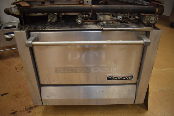 Garland M42-6R Stainless Steel Commercial Natural Gas Powered 2 Burner Range w/ Flat Top, Oven, Over Shelf and Back Splash. BUYER MUST REMOVE. 34x38x58. For Parts. (Education Kitchen) - Image 5 of 8