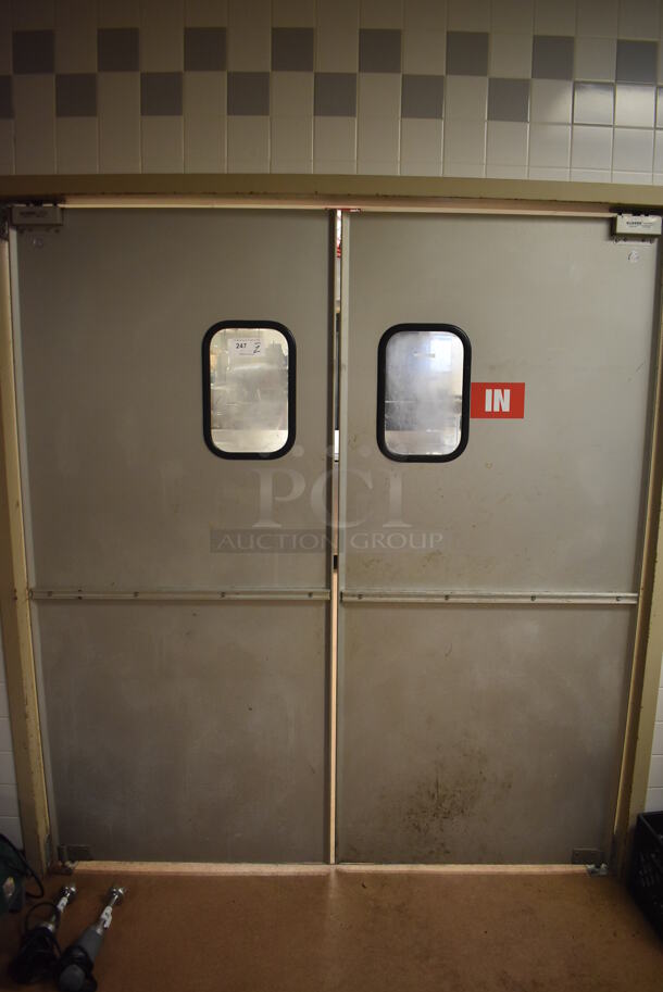 2 Eliason Metal Swinging Kitchen Doors. BUYER MUST REMOVE. 35x1.5x78.5. 2 Times Your Bid! (Dishroom)