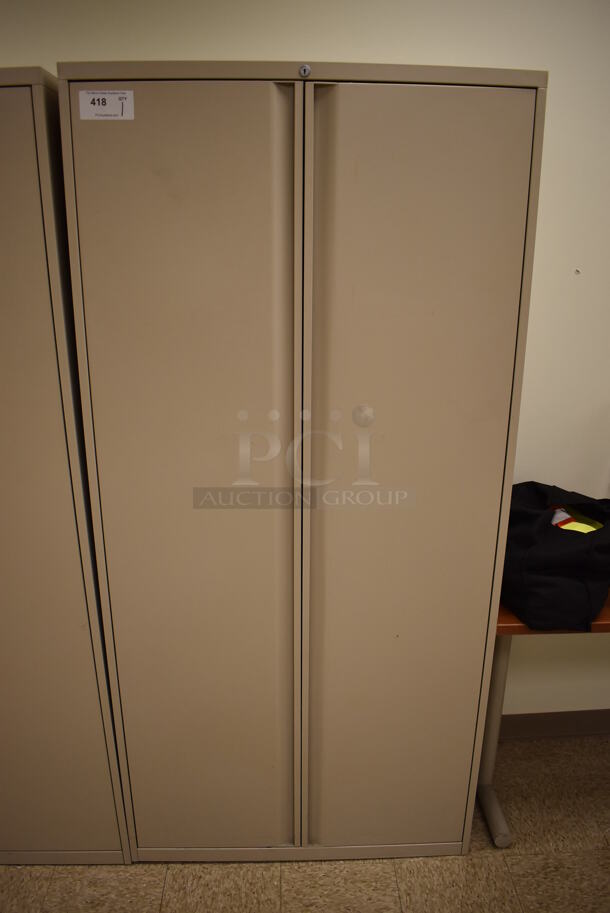 Tan Metal 2 Door Cabinet w/ Contents. 36x18x75. (EMT/Forensics Lab)