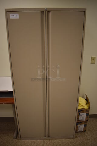 Tan Metal 2 Door Cabinet w/ Contents. 36x18x75. (EMT/Forensics Lab)