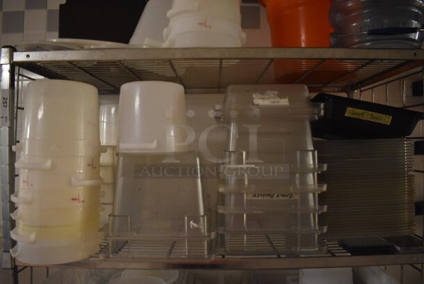 Metal 4 Tier Wire Shelving Unit on Commercial Casters w/ Contents Including Poly Bins and Marble Pieces. BUYER MUST DISMANTLE. PCI CANNOT DISMANTLE FOR SHIPPING. PLEASE CONSIDER FREIGHT CHARGES. 48x24x78. (Dishroom) - Image 3 of 7