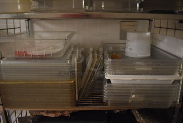 Metal 4 Tier Wire Shelving Unit on Commercial Casters w/ Contents Including Poly Bins and Marble Pieces. BUYER MUST DISMANTLE. PCI CANNOT DISMANTLE FOR SHIPPING. PLEASE CONSIDER FREIGHT CHARGES. 48x24x78. (Dishroom) - Image 4 of 7