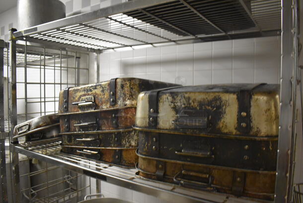 Metal 4 Tier Wire Shelving Unit on Commercial Casters w/ Contents Including Metal Stock Pots and Baking Pans. BUYER MUST DISMANTLE. PCI CANNOT DISMANTLE FOR SHIPPING. PLEASE CONSIDER FREIGHT CHARGES. 48x24x78. (Dishroom) - Image 4 of 6