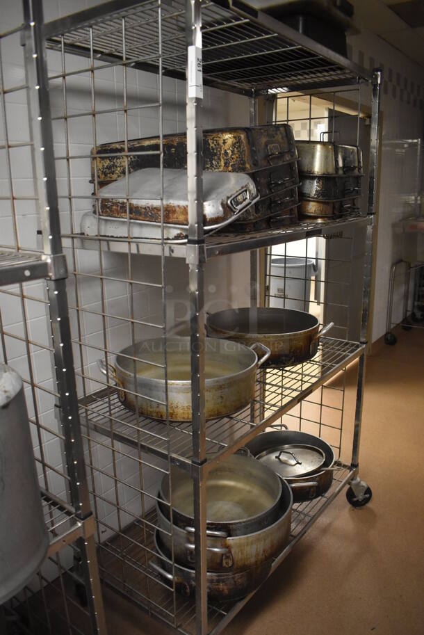 Metal 4 Tier Wire Shelving Unit on Commercial Casters w/ Contents Including Metal Stock Pots and Baking Pans. BUYER MUST DISMANTLE. PCI CANNOT DISMANTLE FOR SHIPPING. PLEASE CONSIDER FREIGHT CHARGES. 48x24x78. (Dishroom) - Image 6 of 6