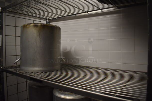 Metal 4 Tier Wire Shelving Unit on Commercial Casters w/ Contents Including Metal Stock Pots and Sauce Pans. BUYER MUST DISMANTLE. PCI CANNOT DISMANTLE FOR SHIPPING. PLEASE CONSIDER FREIGHT CHARGES. 48x24x78. (Dishroom) - Image 2 of 4